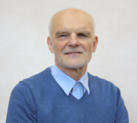Es ist ein Porträt von Jürgen Frost zu sehen.