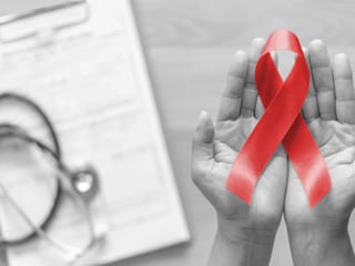 Rote Schleife (Red Ribbon) als Zeichen für Solidarität mit HIV-Infizierten.