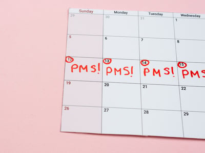 Kalender mit Eintrag PMS.